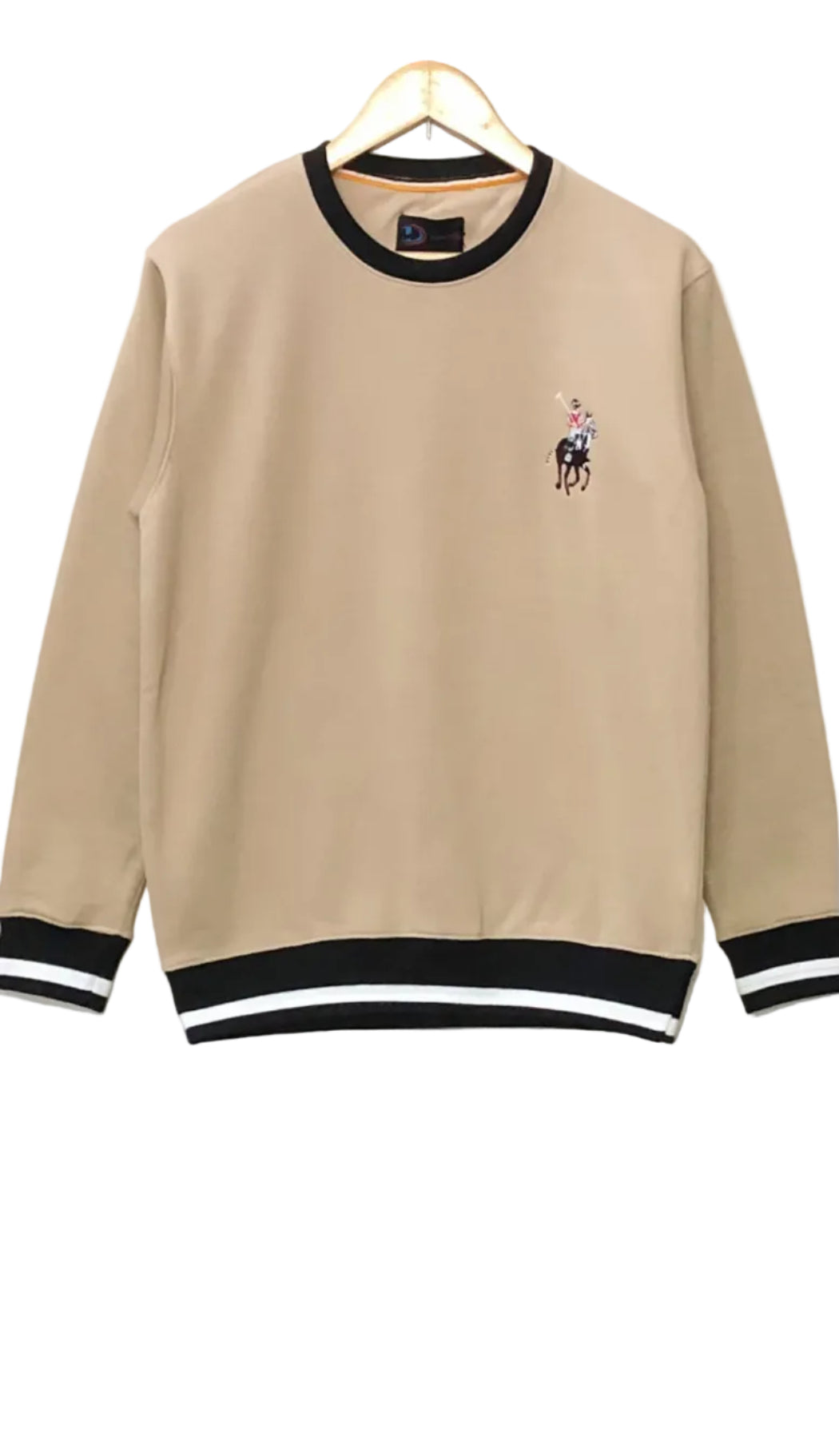Beige sweatshirt with black trim on a hanger against a white background