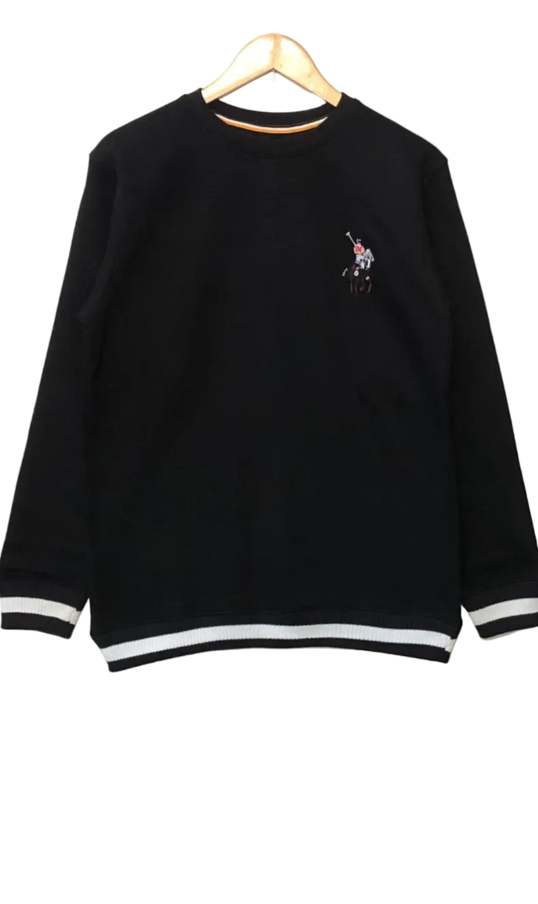 Black sweatshirt with a logo on a hanger against a white wall
